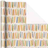Rollo papel de regalo con velas de colores, 20 pies cuadrados.